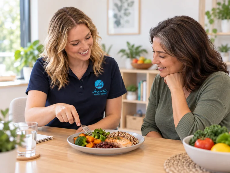 Dietitian and an adult discussing a balanced meal for heart and diabetes support